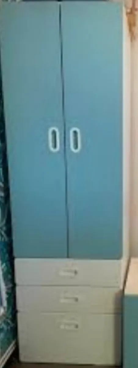 Wardrobe with drawers and hanging rail