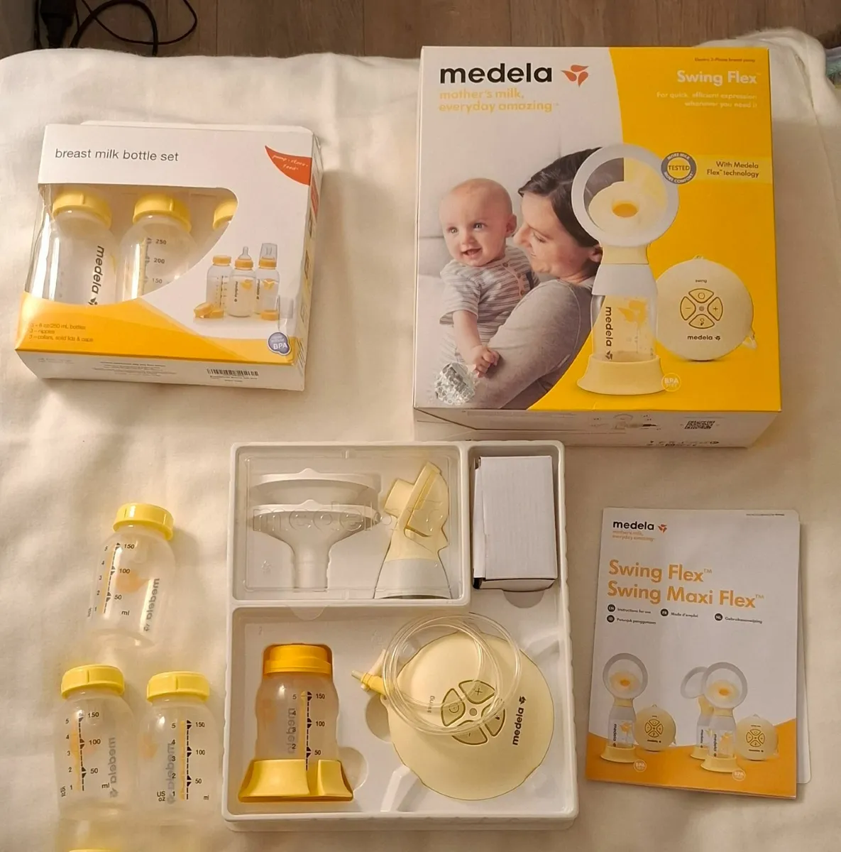 Medela electric breast pump & brand new bottle set - Image 1
