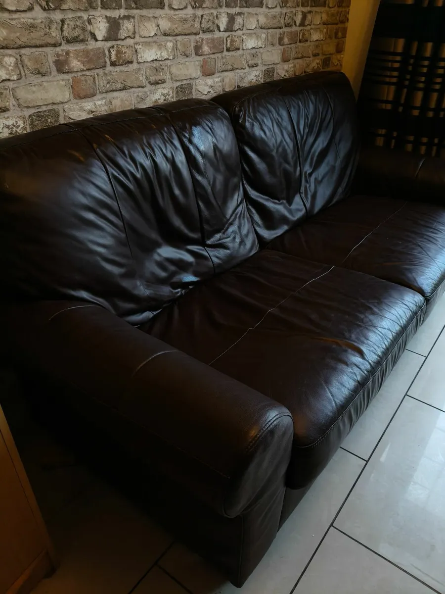 Free 2 seater brown leather sofa - Image 1