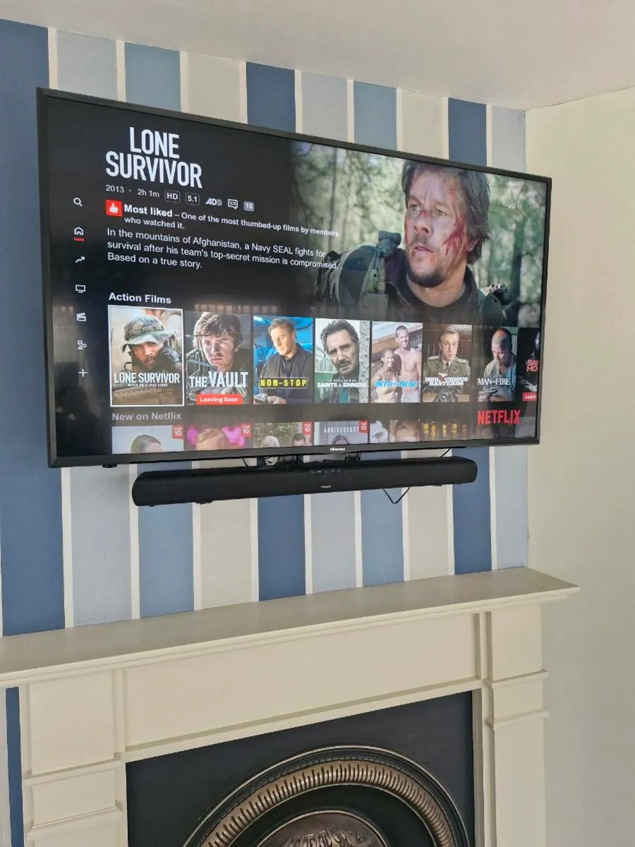 50 inch 4k Ultra HD Smart tv, sound bar and wall b - Image 1