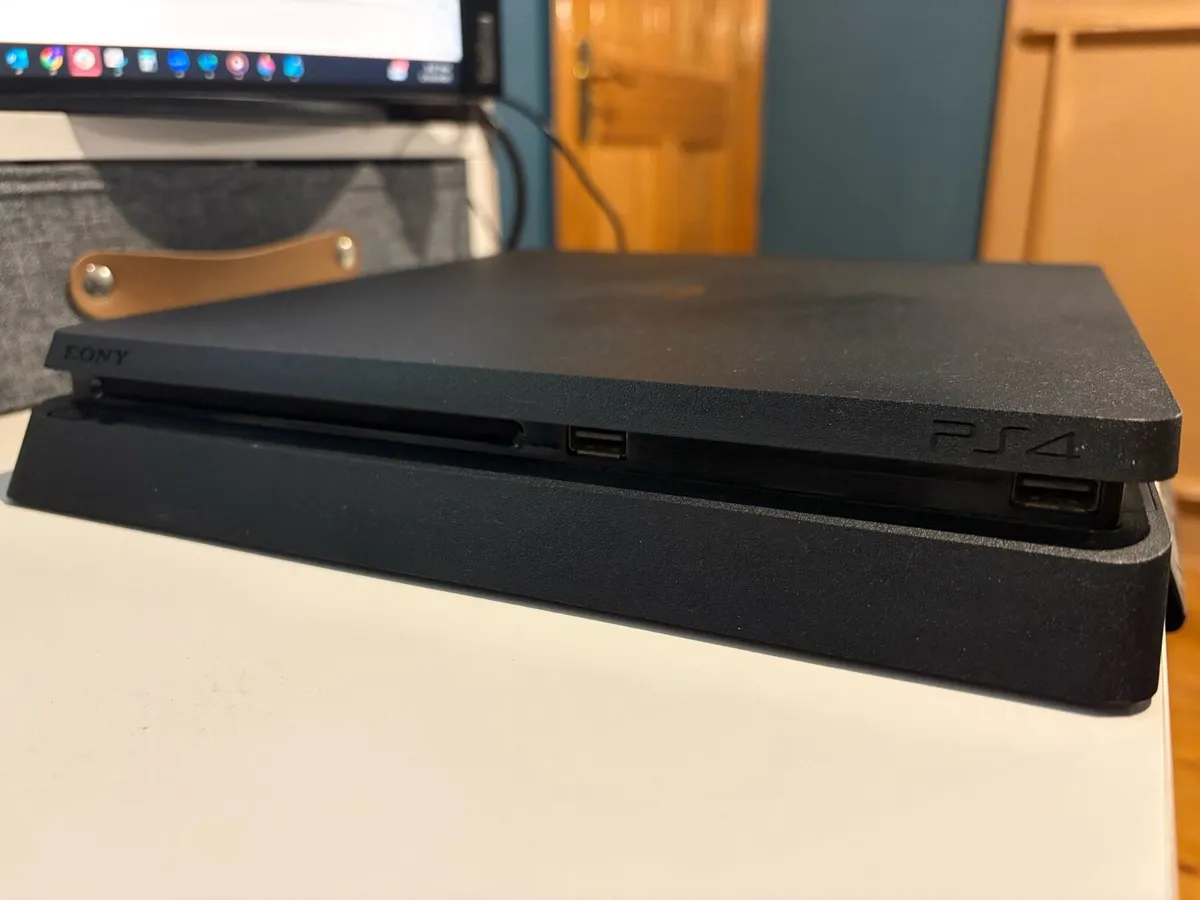 PS4 Slim, Cables, 2 Controllers & 2 Games - Image 2
