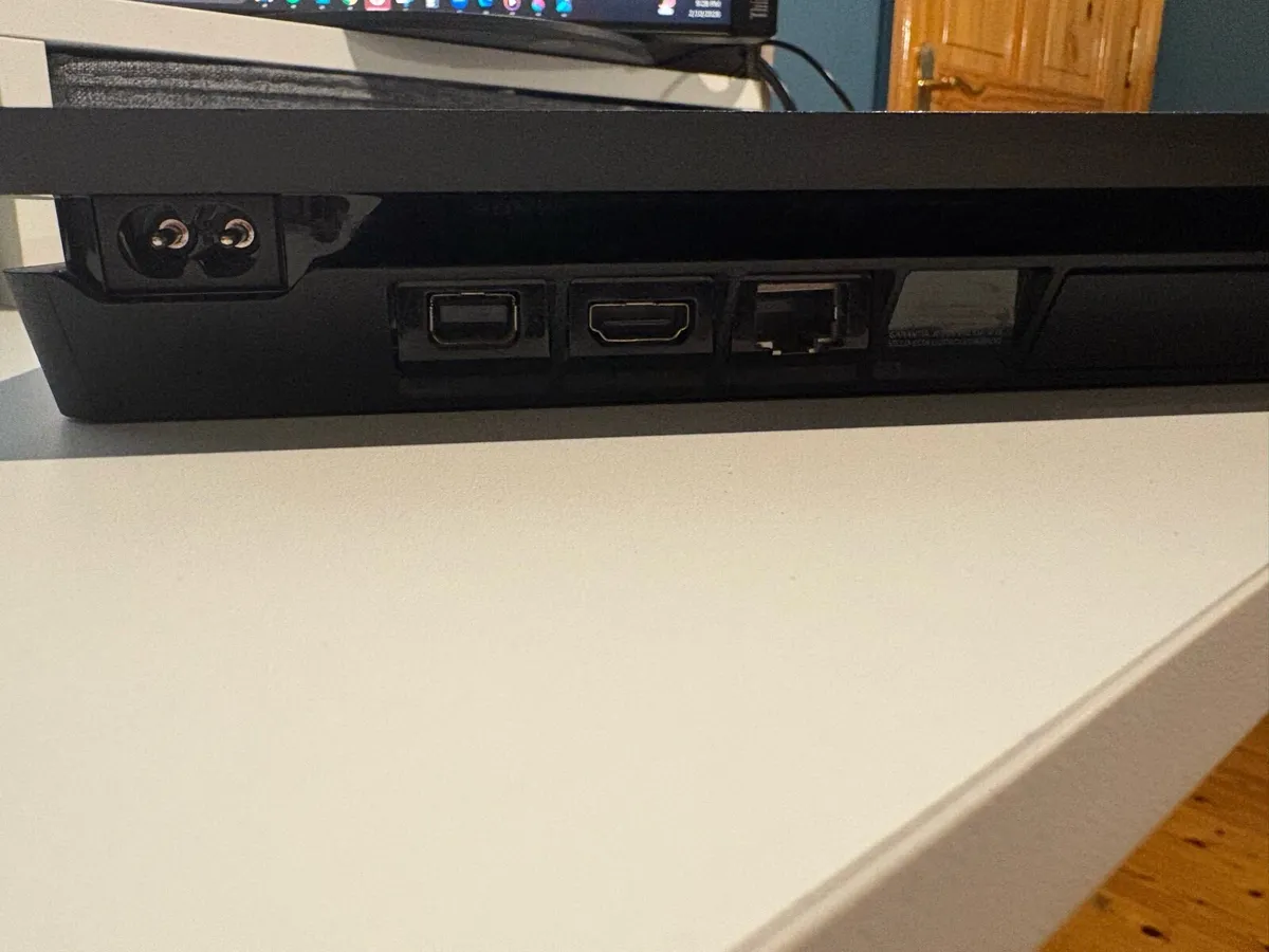 PS4 Slim, Cables, 2 Controllers & 2 Games - Image 4