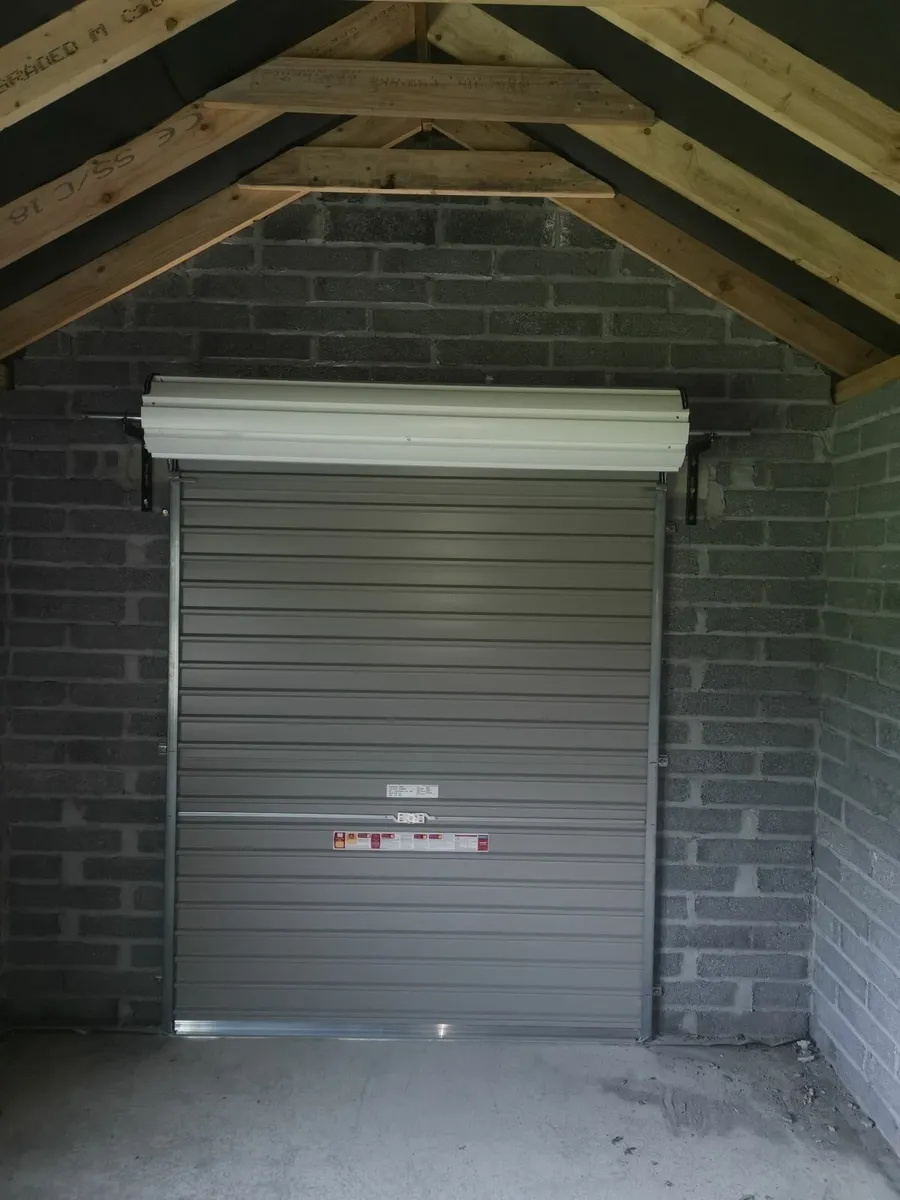 roller  door  auto  kit  and  remotes - Image 1