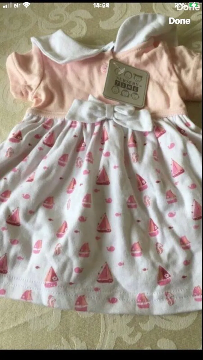Girls BNWT newborn dress €5 - Image 1
