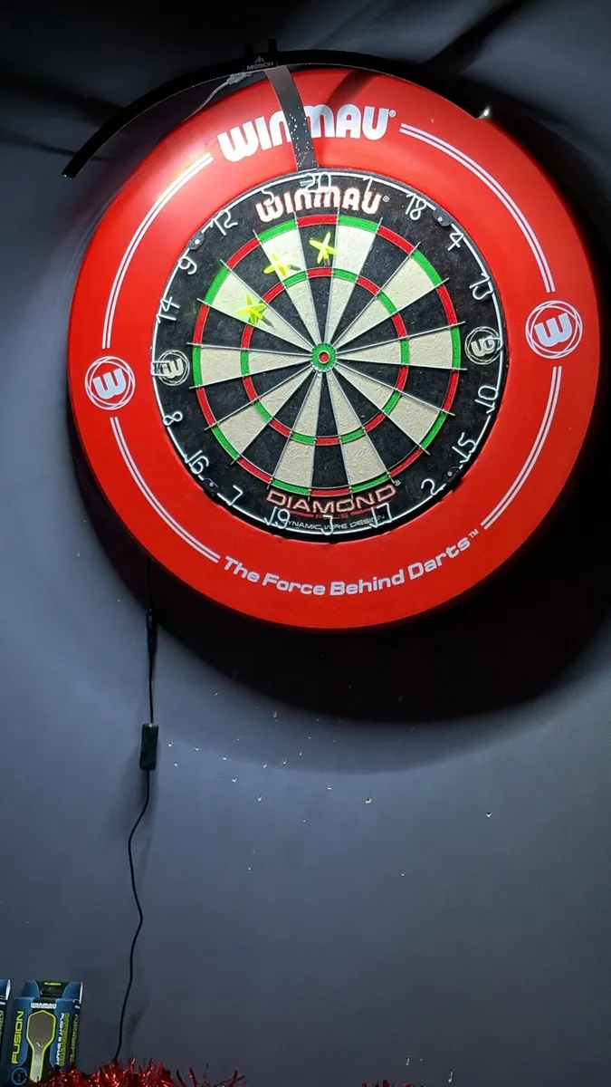 Winmau dart board with lights and darts