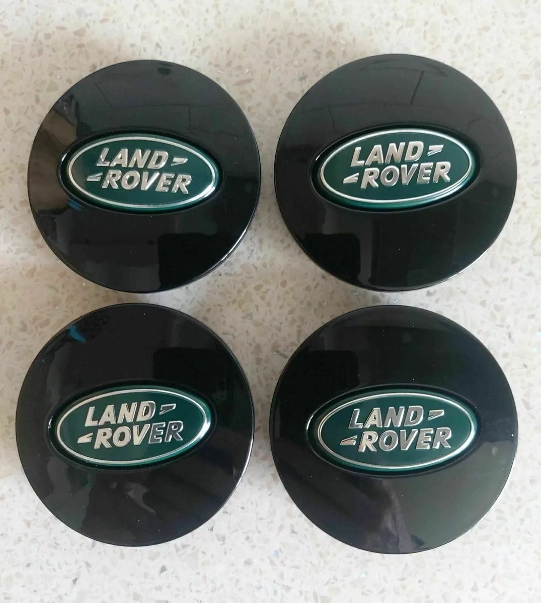Green/black Land Rover centre caps - FREE POST - Image 1