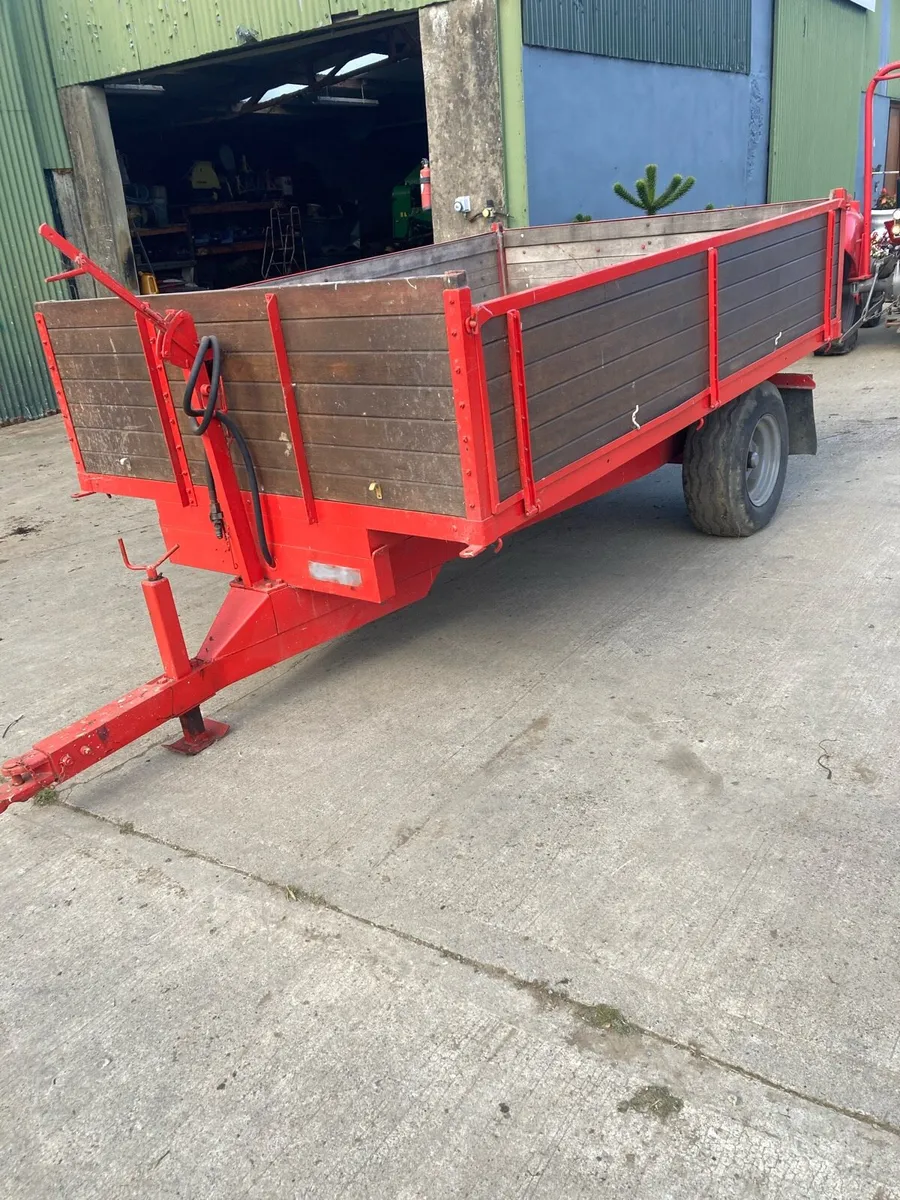 Small tractor tipping trailer - Image 1