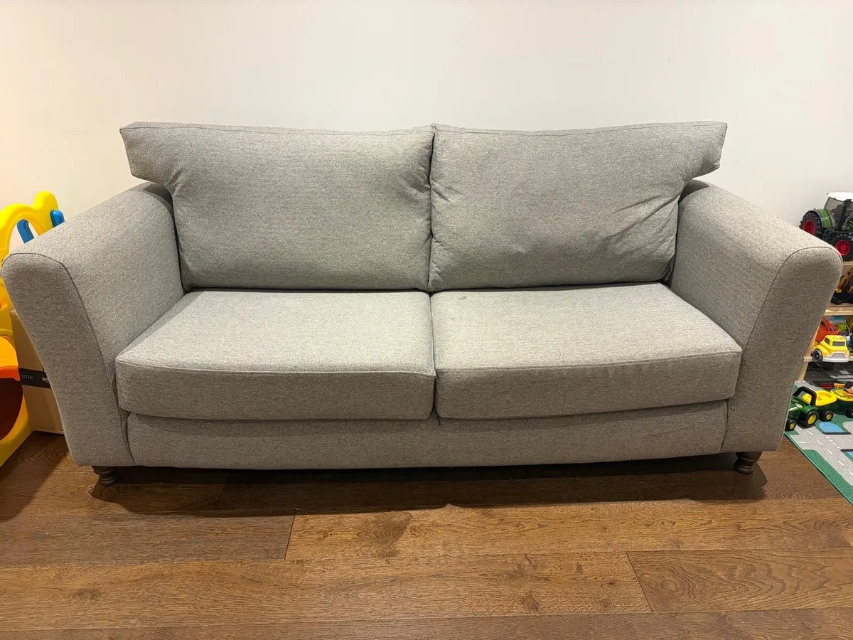 Grey 3 seater couch with matching Ottoman - Image 1