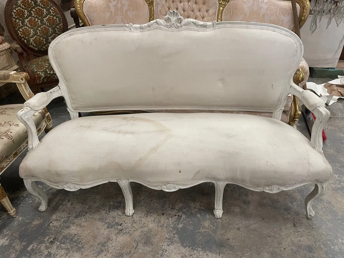 Old white salon sofa