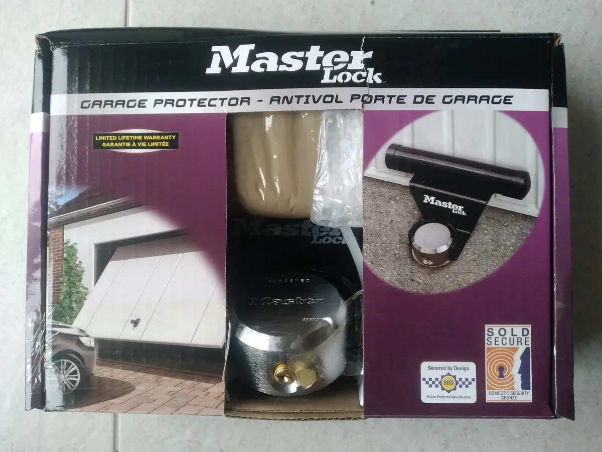 Security lock for 'tilt up' garage door