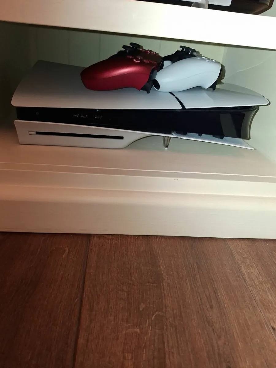 Playstation 5 plus extra controller and 2 games