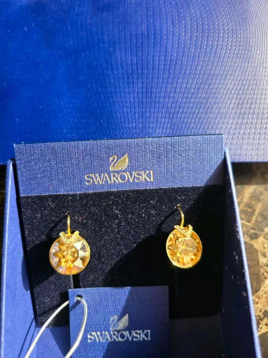 Swarovski earing and bracelet - Image 1