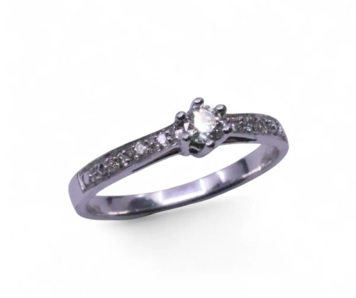 Diamond solitaire ring with diamond shoulders 9k - Image 1