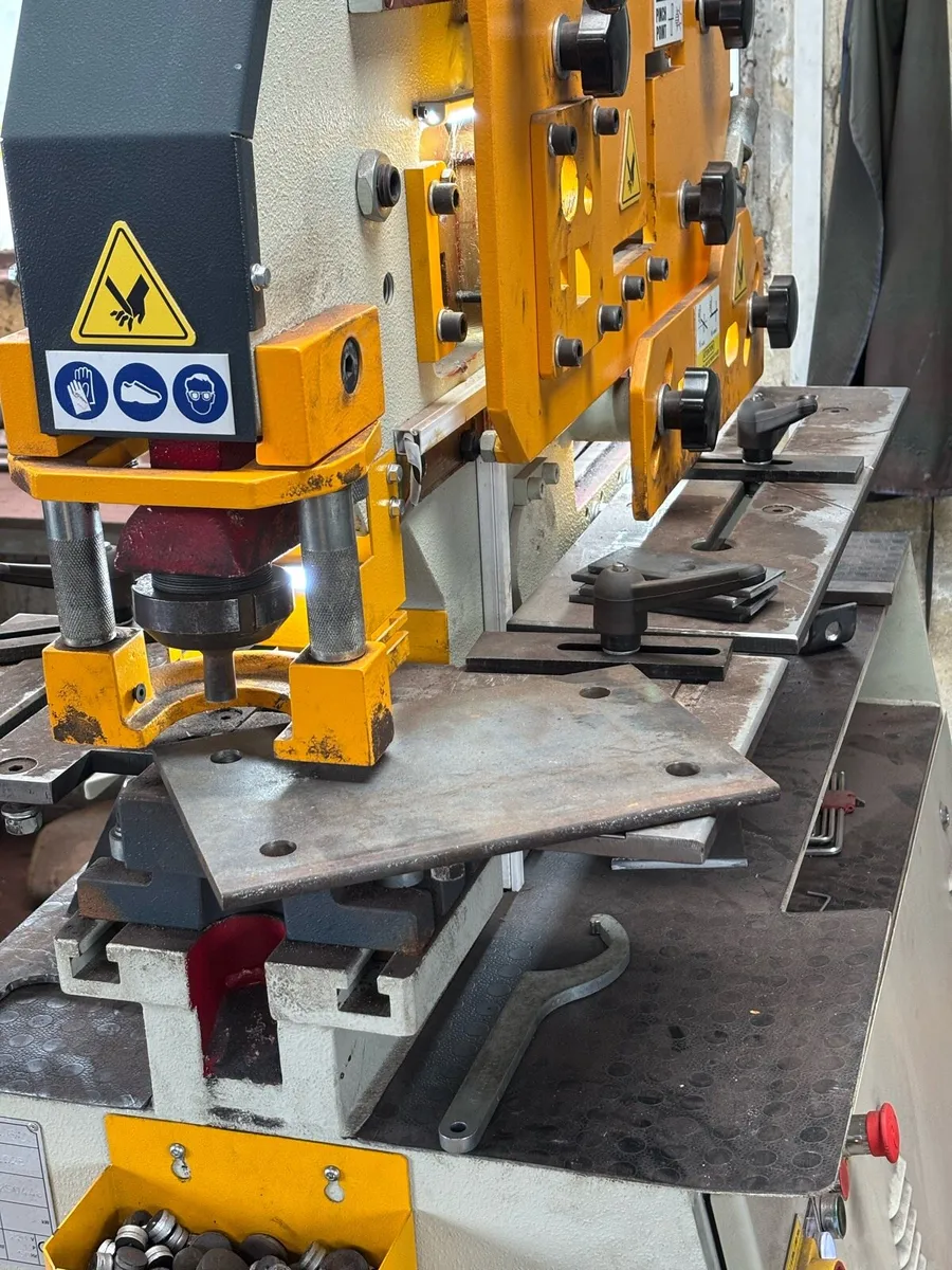 Hole Punching and Bracket Fabrication