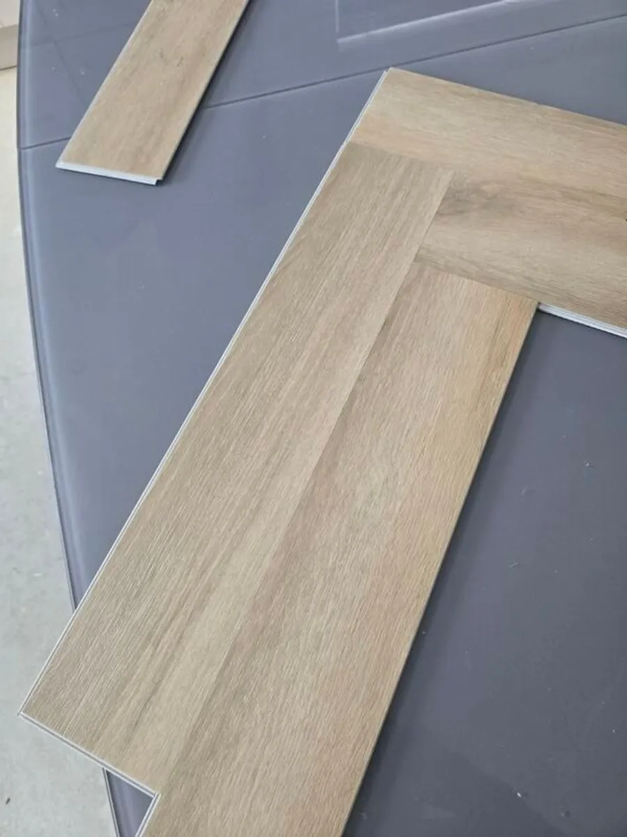 TC Matthews SPC Light Oak Herringbone flooring - Image 1