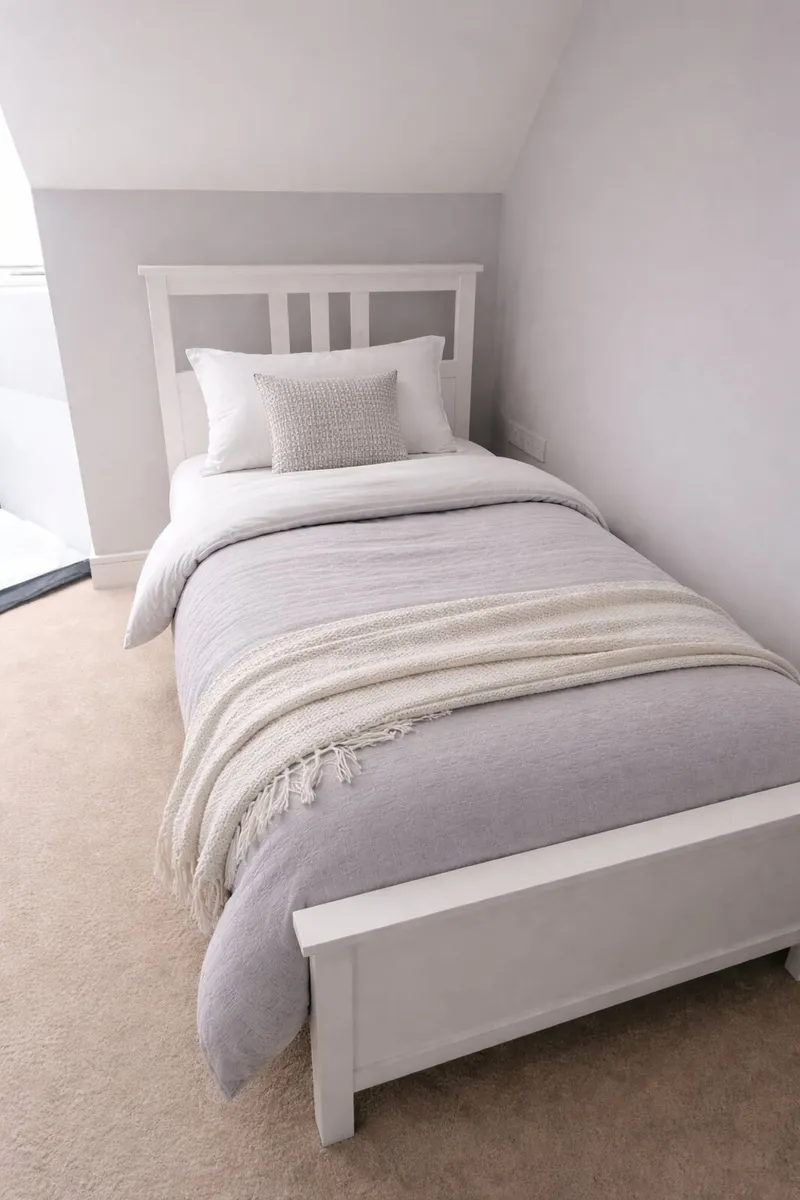 Two white framed Hemmnes IKEA single beds - Image 1