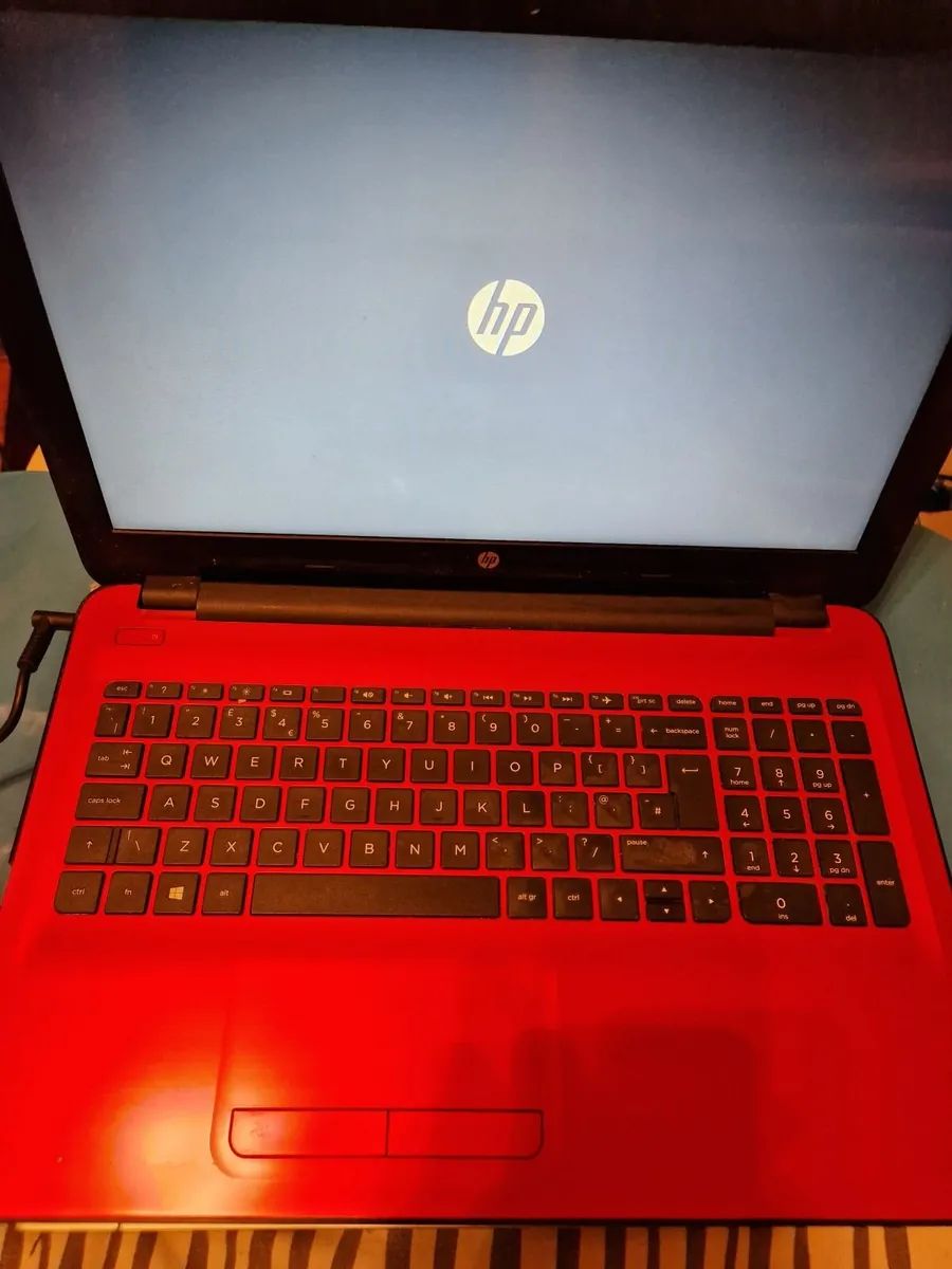 HP Laptop, AMD A6-7310 APU 2.0GHZ, 4GB, 1 TB, RED - Image 1