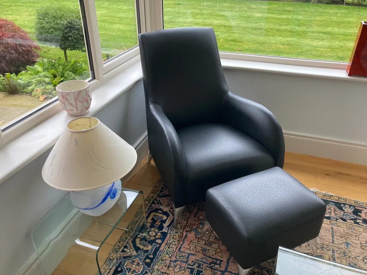 Contemporary Armchair and ottoman.