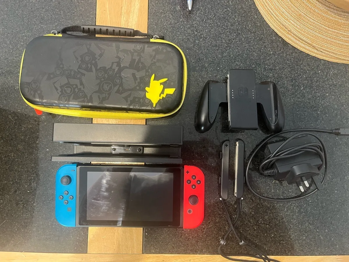 Nintendo Switch with case - Image 1