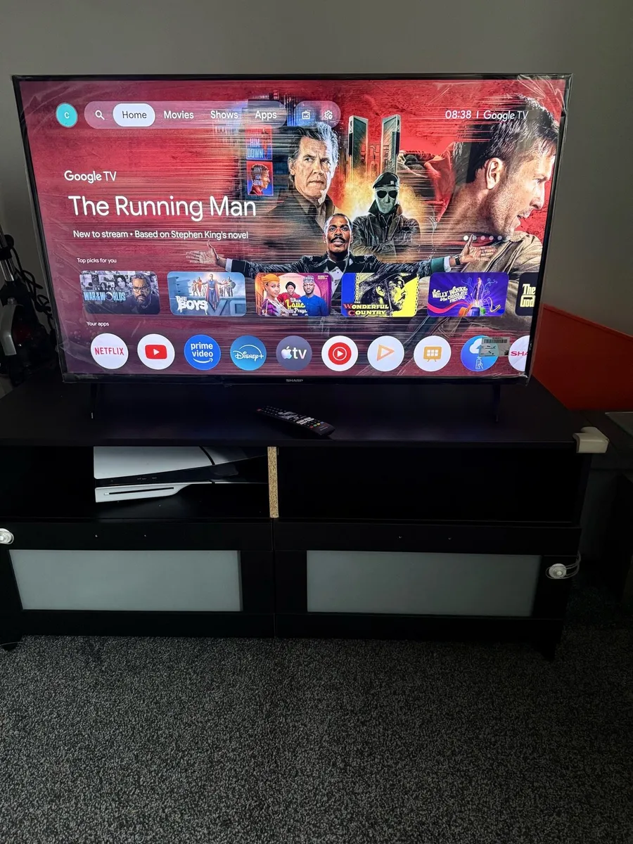 Very new 43 inches smart TV and TV stand