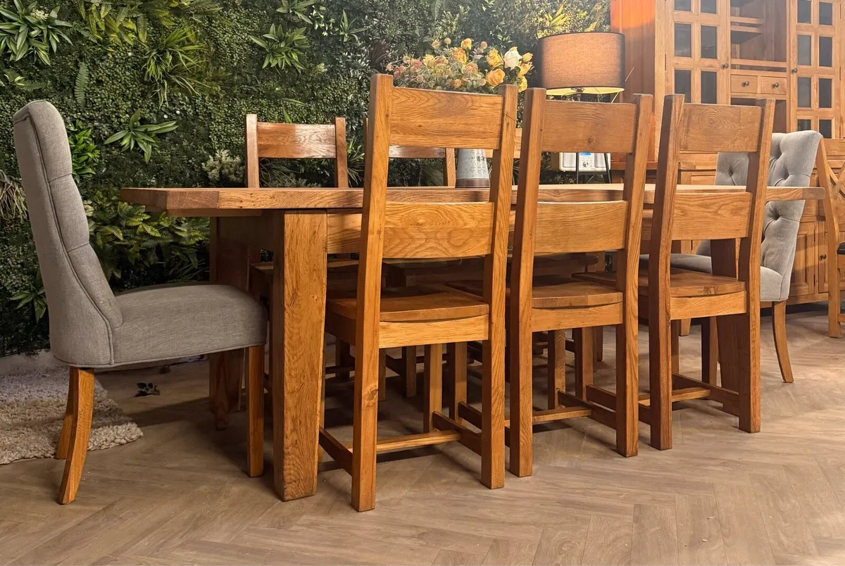 Extending oak kitchen table & 8 chairs - Image 1
