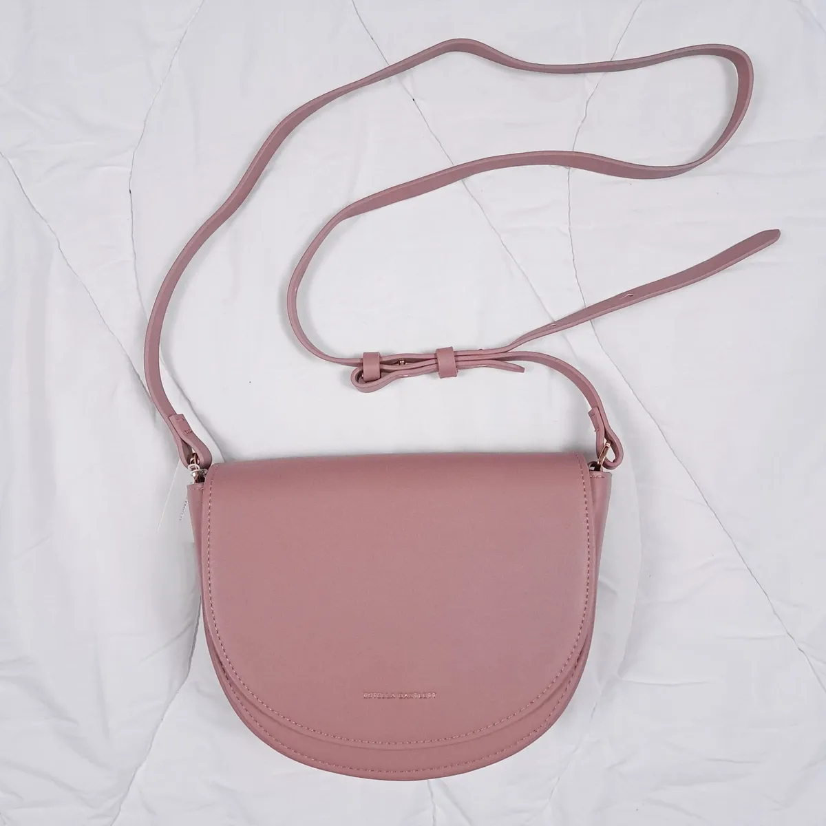 Estella Bartlett Pink Half Moon Crossbody Bag - Image 1