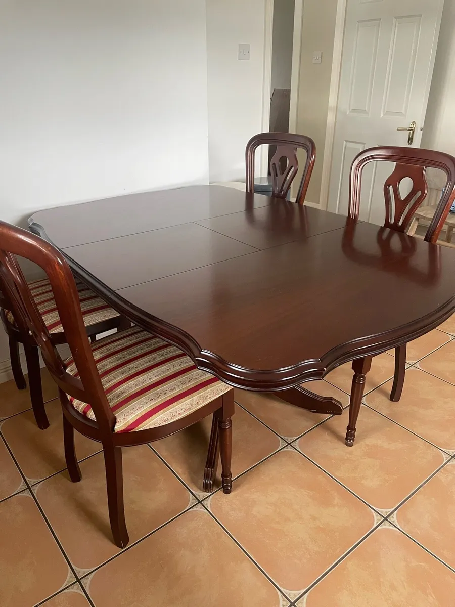 SALE: Mahogany extendable dining table and chairs - Image 1