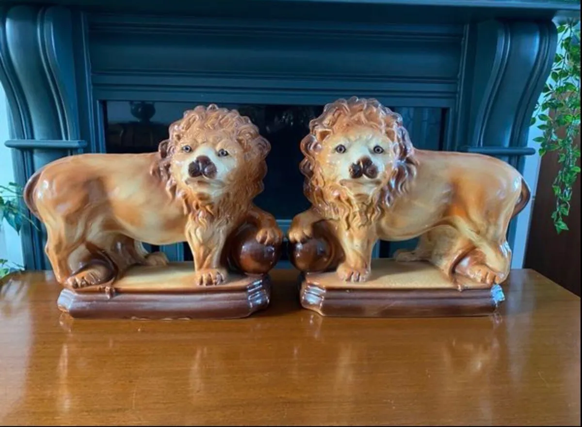 Antique Pottery Lions - Image 1
