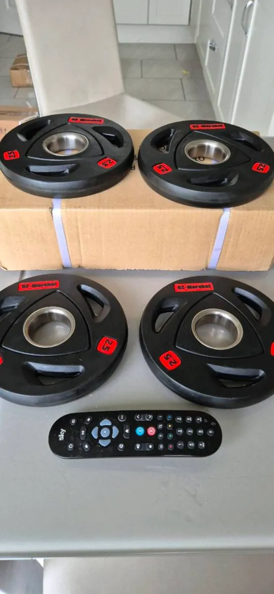 Brand new 4x2.5kilo olympic weight plates - Image 1