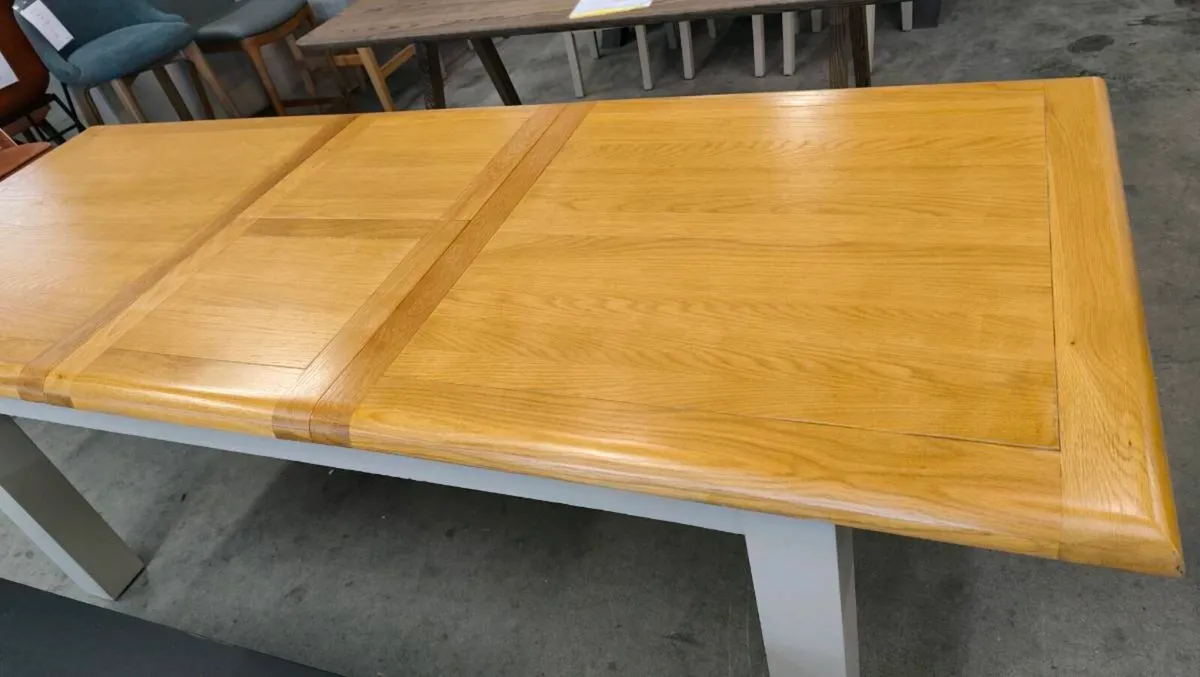Extending Oak Dining Table Ex Display Like New - Image 1