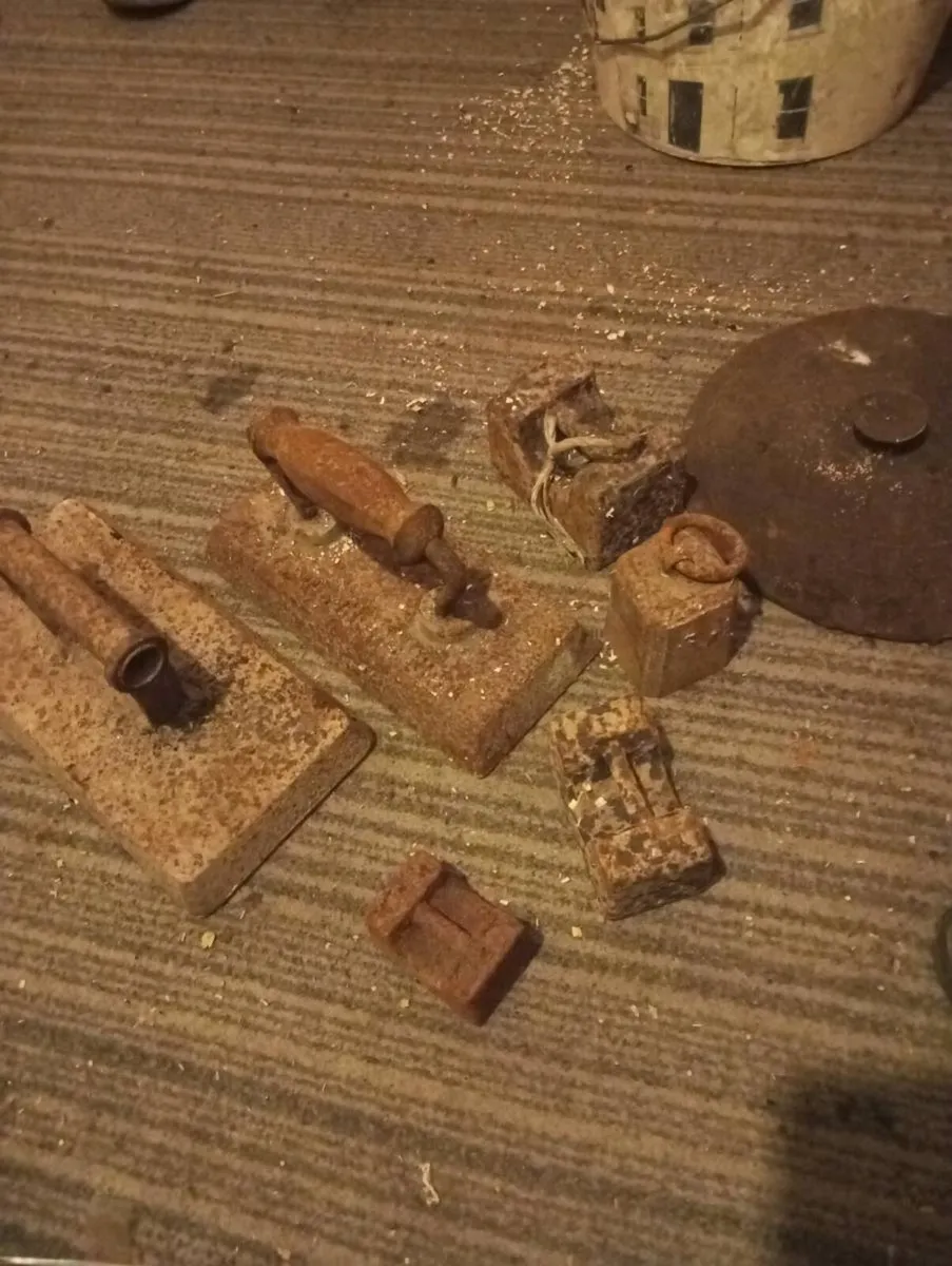 Old weights and  sad irons