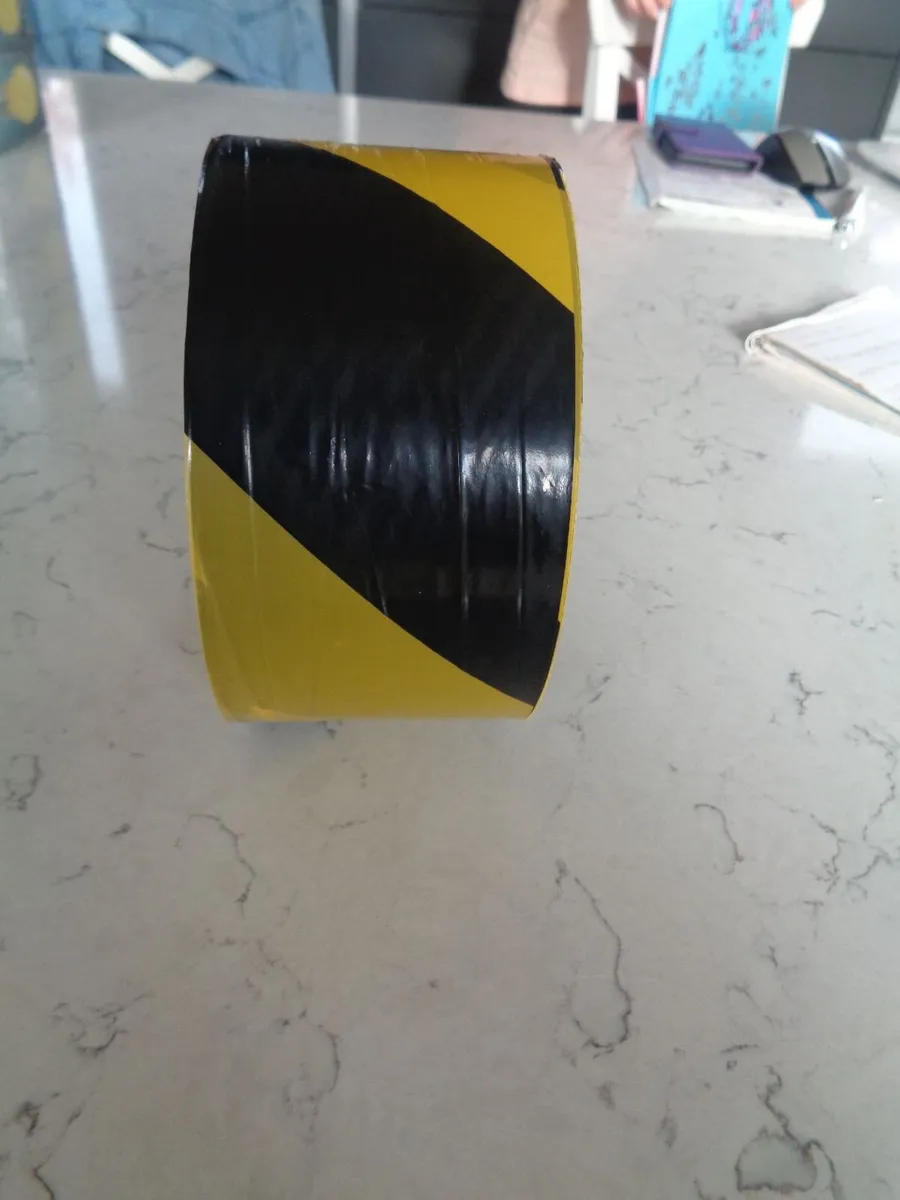 Roll of Plastic Hazard Tape for Sale - Image 1