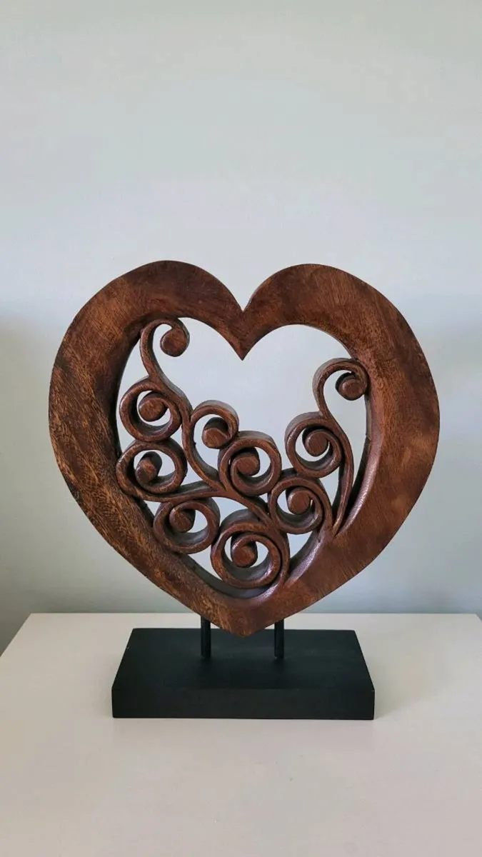 Large wooden carved heart sculpture