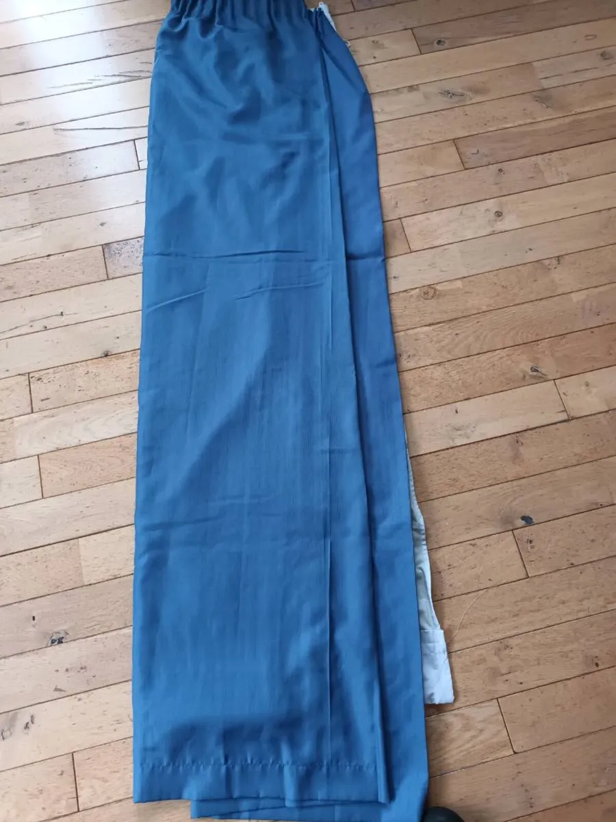 Blue curtains with black out lining - Image 1