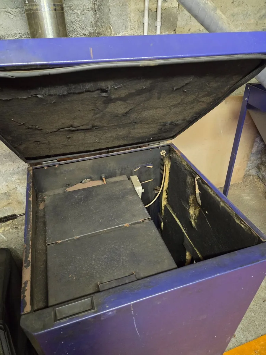 Wood pellet boiler and feeder - Image 1