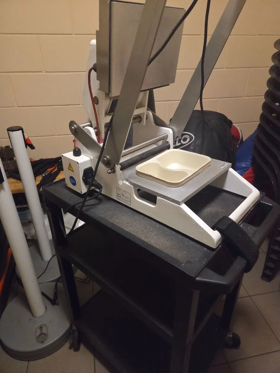 Lid sealer - Image 1