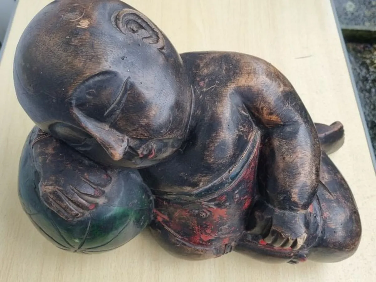 A large wooden statue of a sleeping Buddha - Image 2