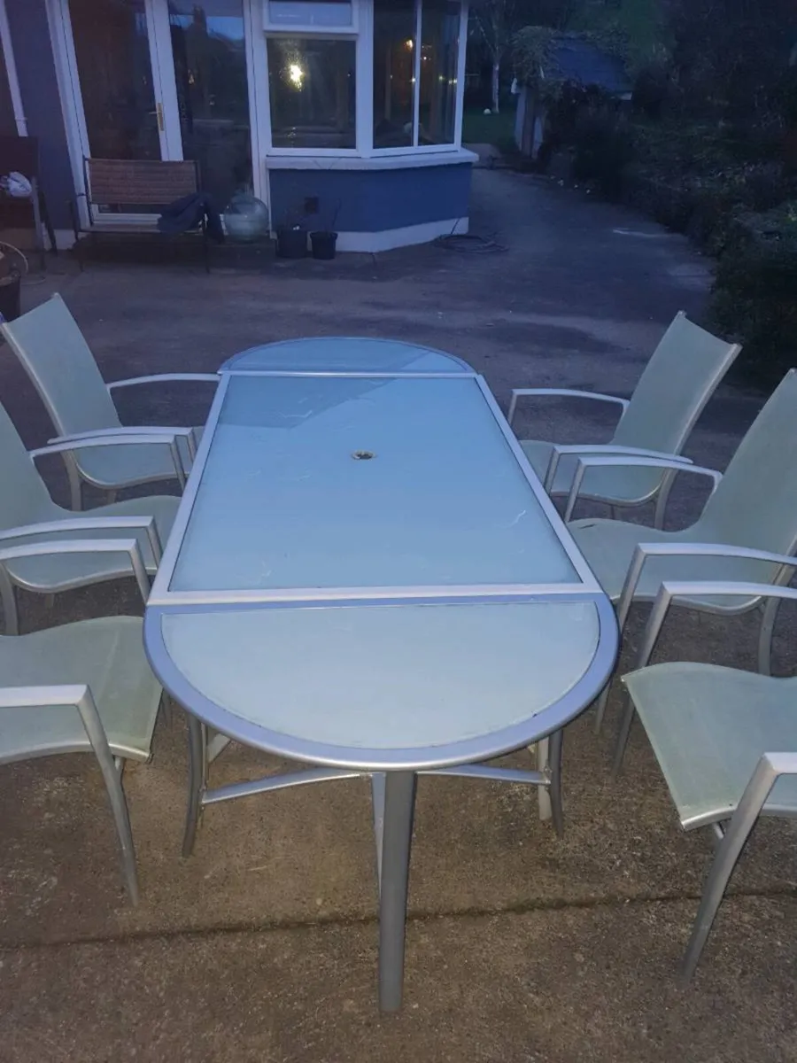 Patio table and chairs - Image 1