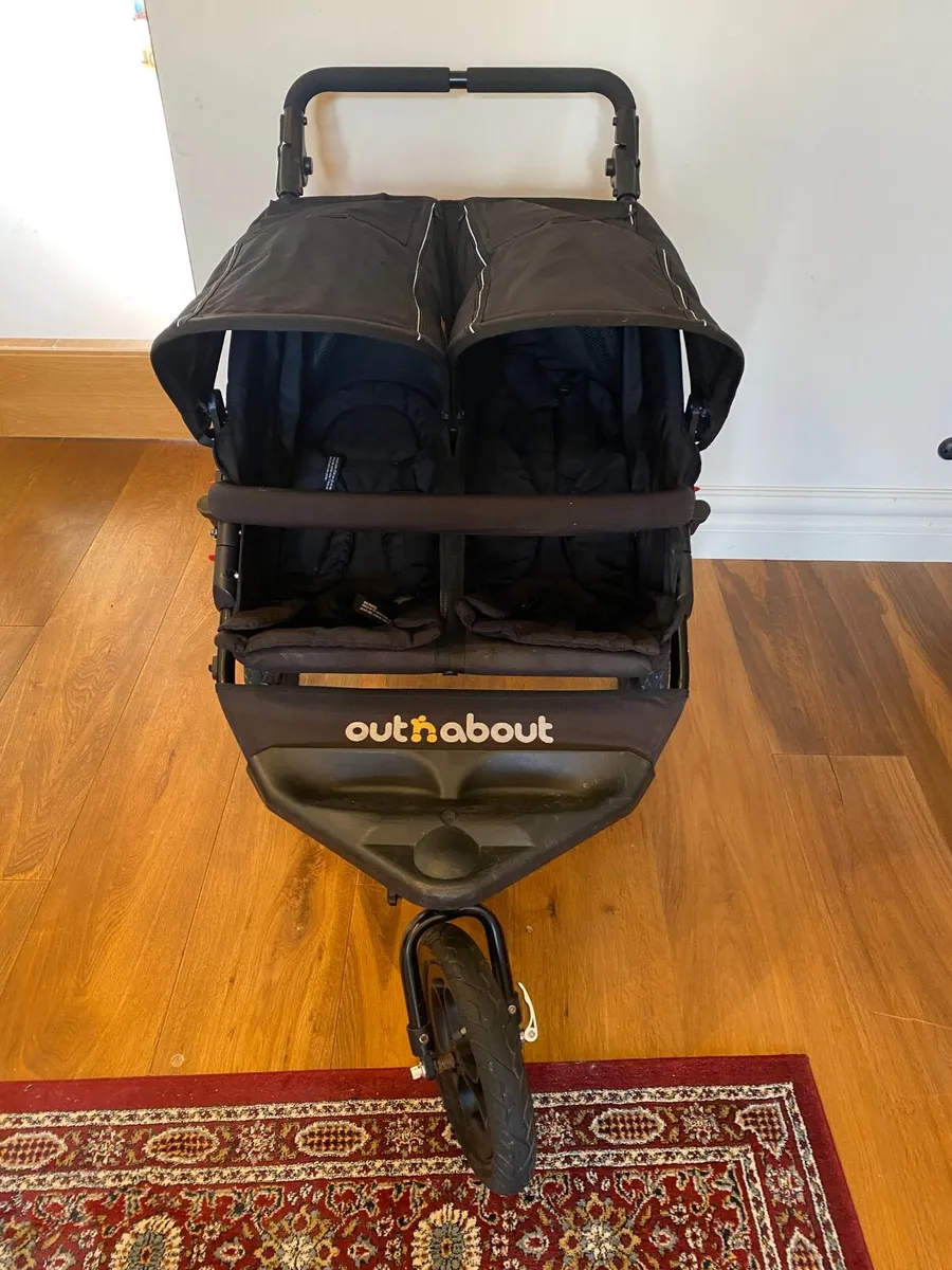 Out n about nipper double buggy with baby insert - Image 1
