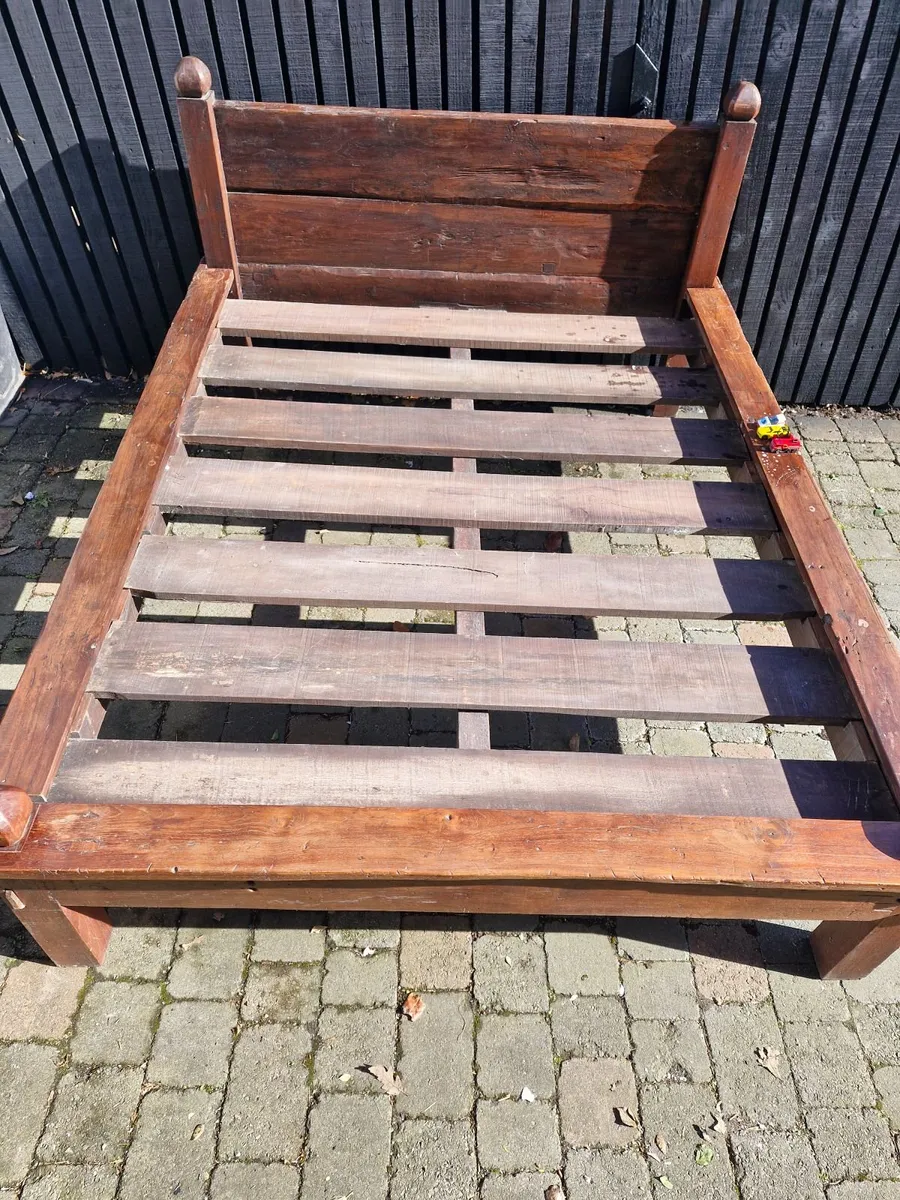 Ironwood poster bed frame and Maghony fire place f - Image 1