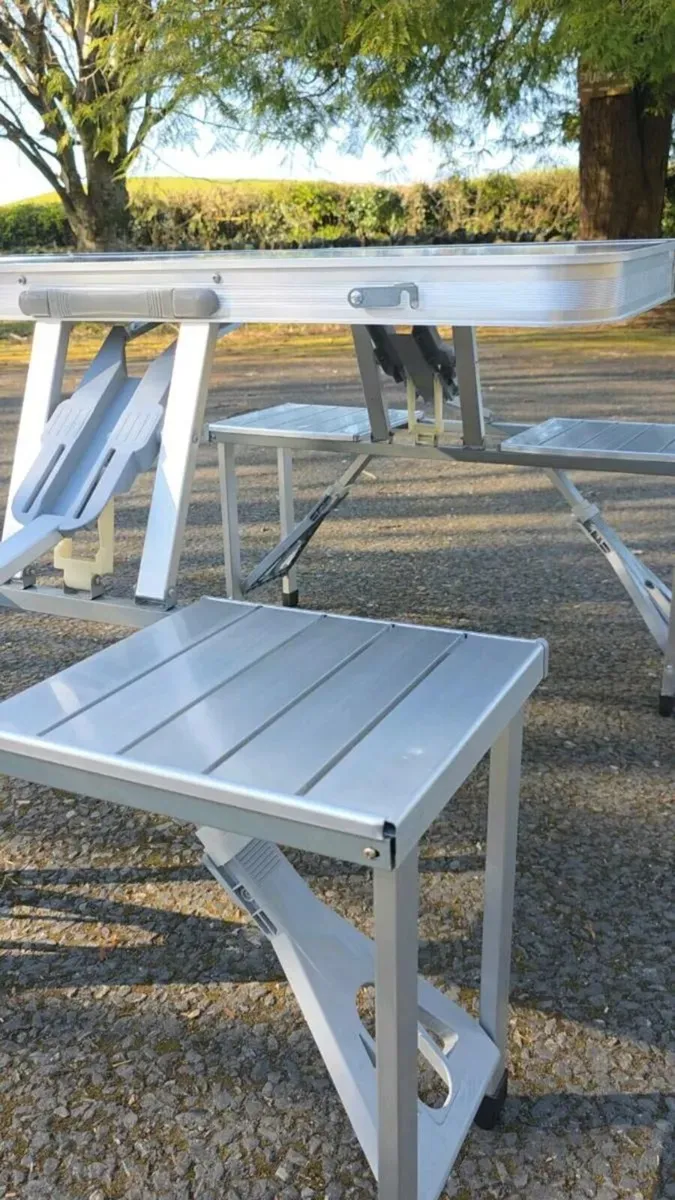 Foldable camping table with four seats. - Image 3
