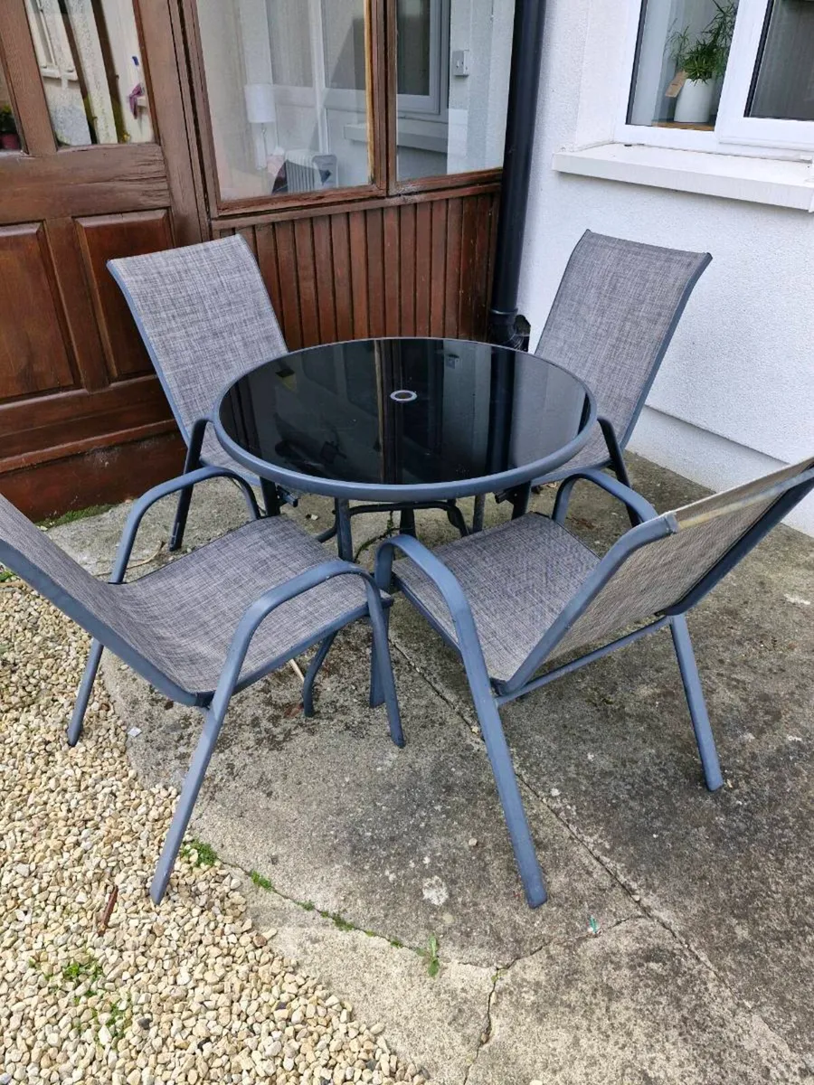 Patio table and 4 chairs