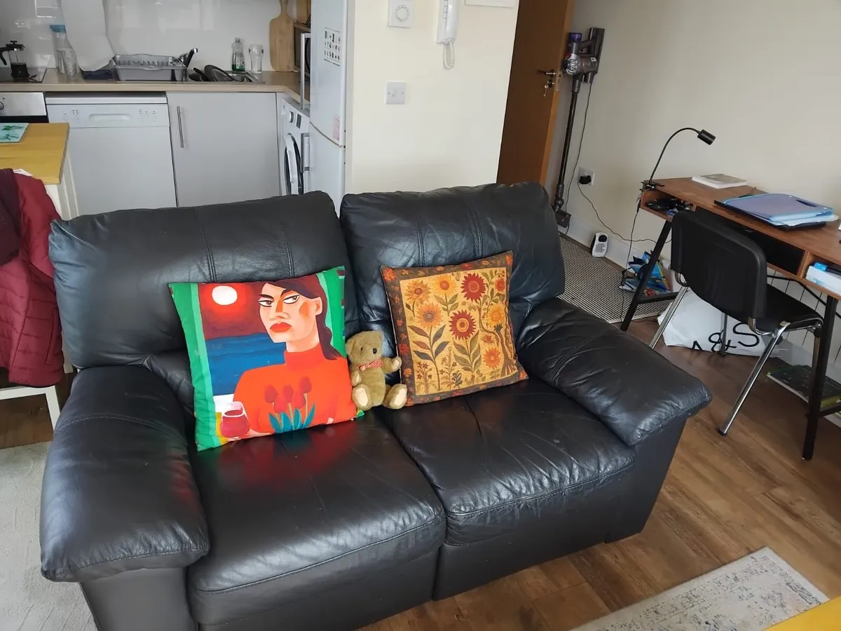 Two seater manual recliner black  leather - Image 1