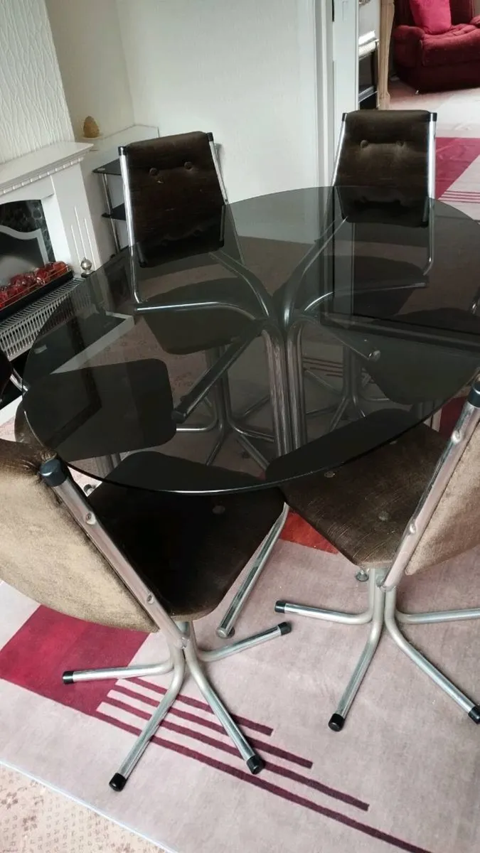 Glass dining room table and chairs - Image 1