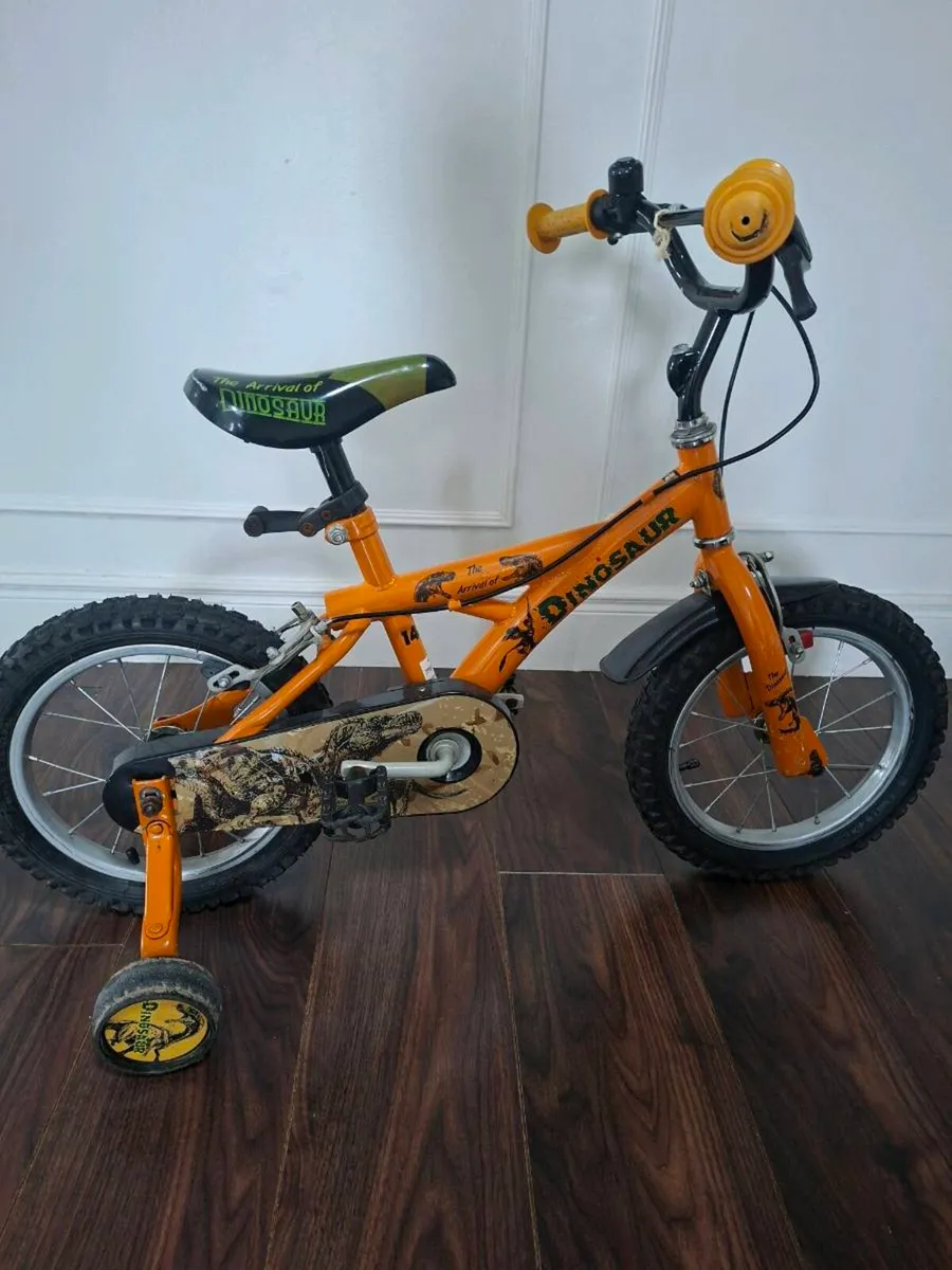 Child's dinosaur themed bike - Image 1