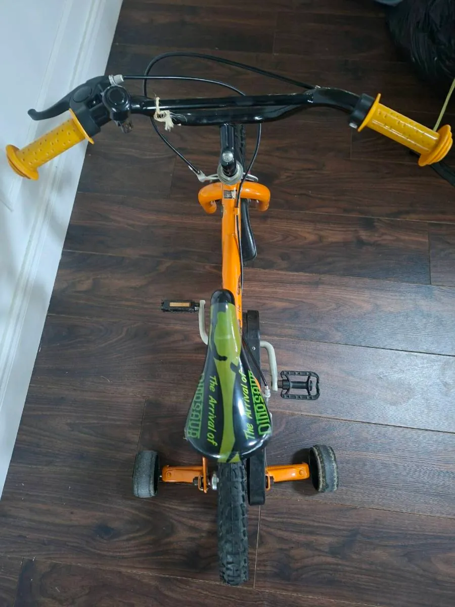 Child's dinosaur themed bike - Image 2