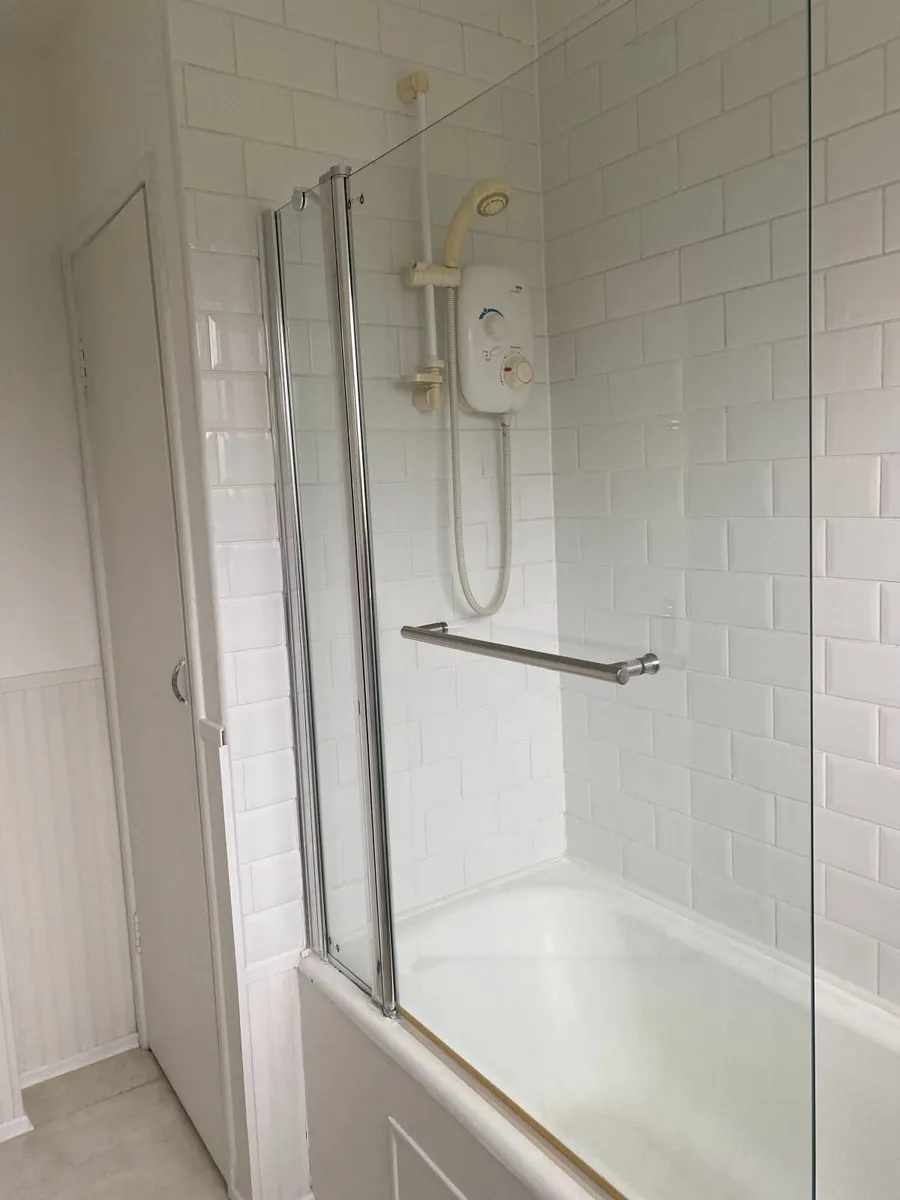 Glass over bath Frameless pivot shower screen - Image 2