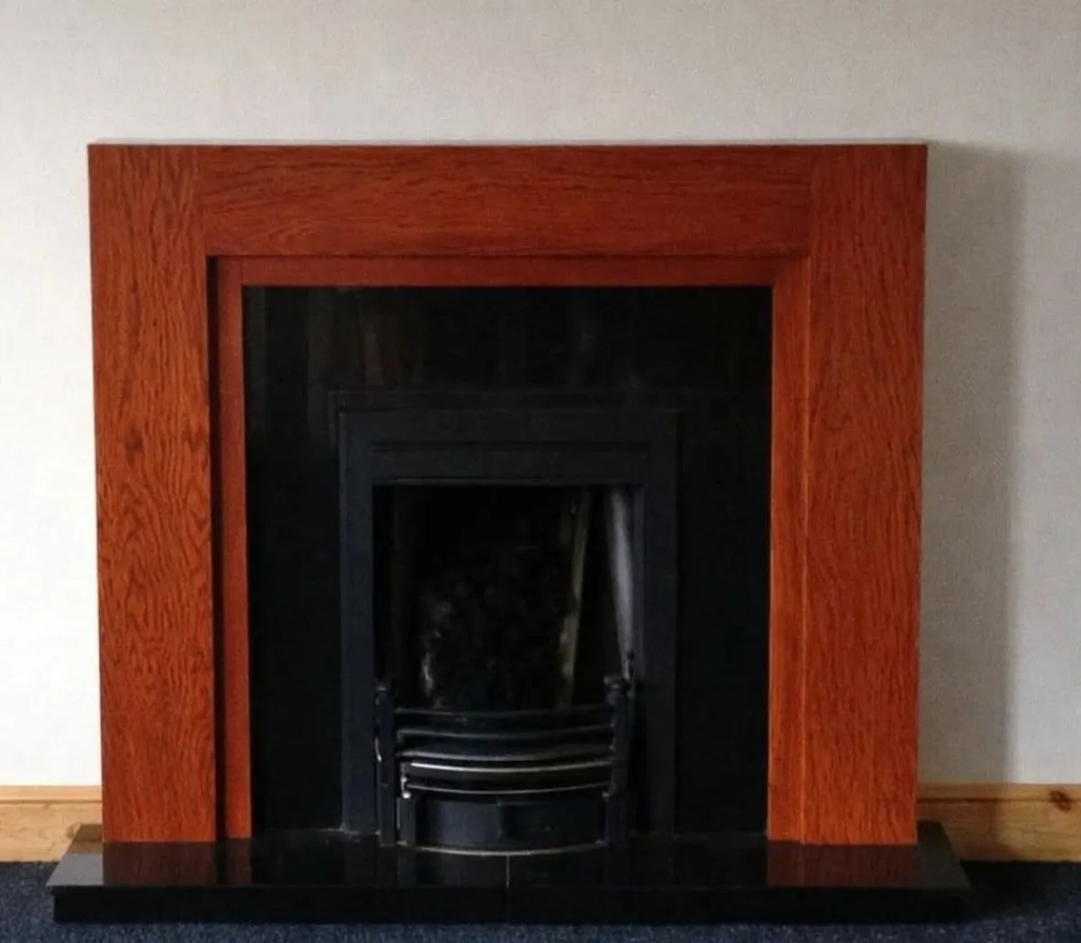 Marble fireplace, with wooden surround