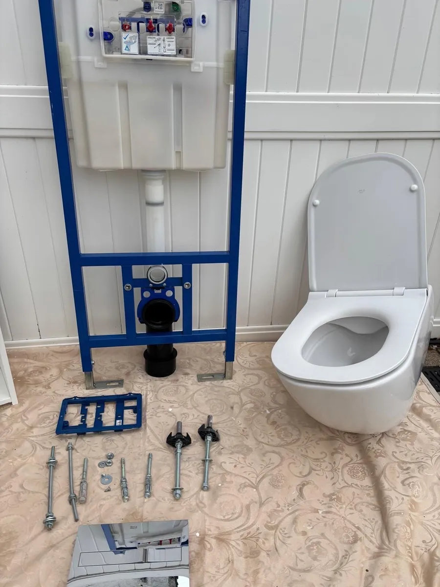 Built in cistern, toilet, storage and sink - Image 1