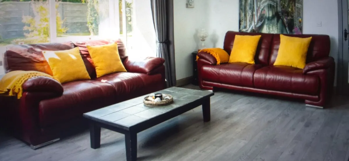 2 x Milan red leather sofas - Image 1